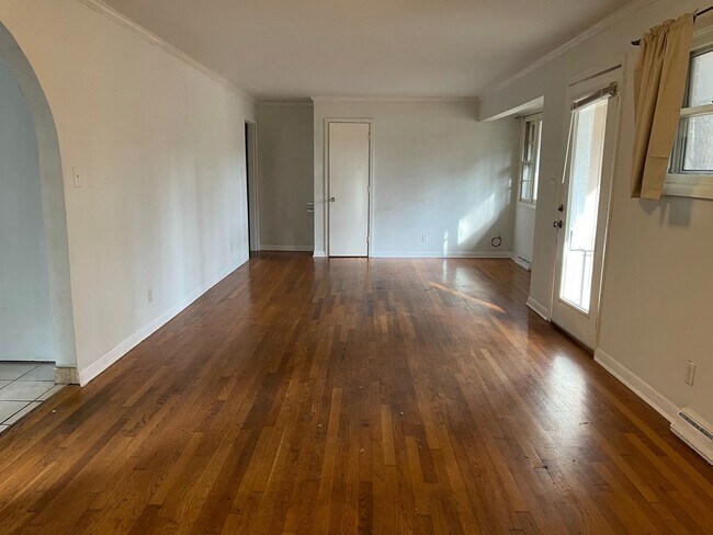 Building Photo - Large Duplex home with giant deck, parking, in quiet neighborhood, Available in June