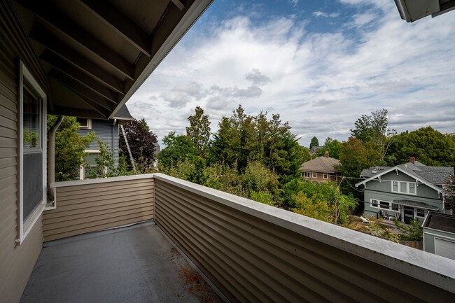 Building Photo - Traditional Four-Corner Craftsman Home on ...