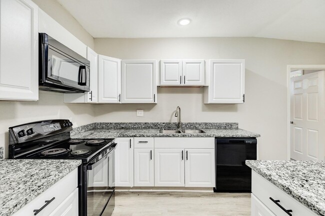 Building Photo - Recently Renovated 4-Bedroom Home with Mod...