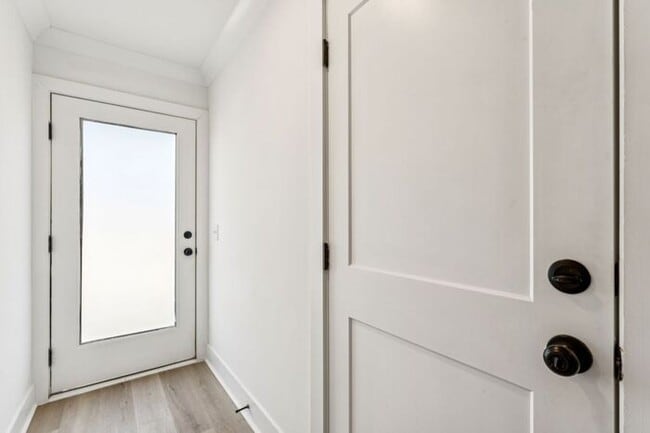 Building Photo - High-End 2BR Townhome | Rooftop Terrace + 2-Car Garage | 24-Unit Community