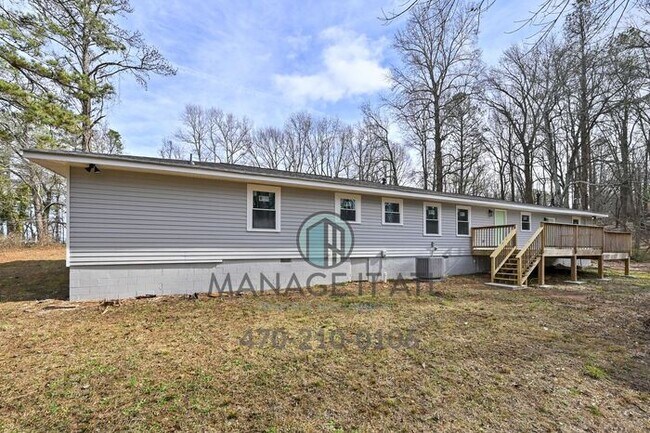 Building Photo - FULLY remodeled 4-bedroom, 2-bathroom house in Gainesville!
