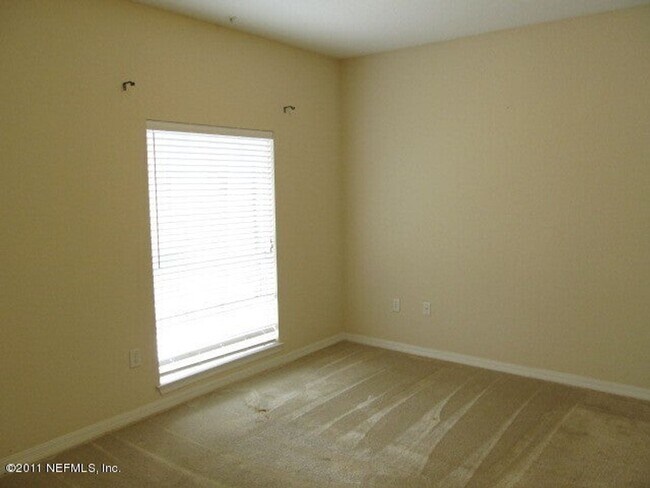 Building Photo - 2-bedroom condo - ground floor