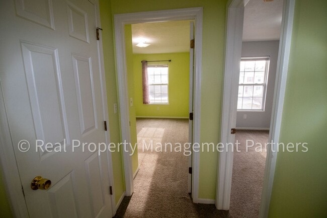 Building Photo - Forest Hills 3 Bed Townhome with Garage, Pond View and Some Utilities Included