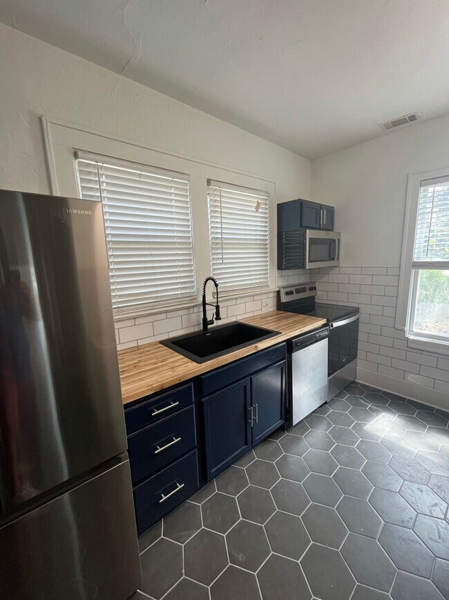 Kitchen with butcher block counters - 722 E 35th St