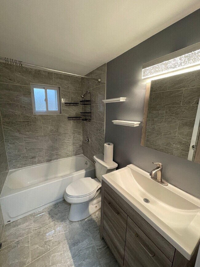 Building Photo - Beautifully updated 3 bed 1 bath home with garage and off-street parking in Penn Hills!