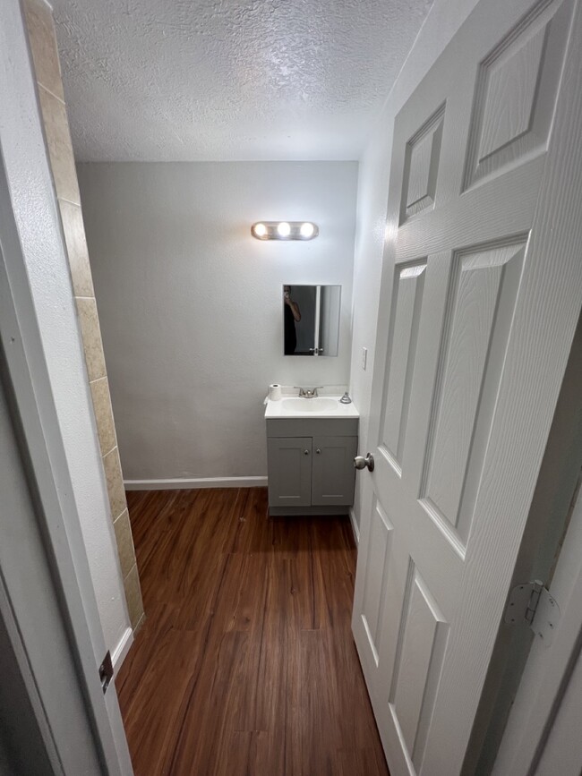 Bathroom with new cabinets - 116 Frawley St