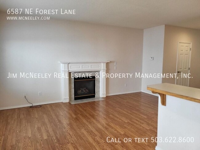 Building Photo - 6587 NE Forest Ln