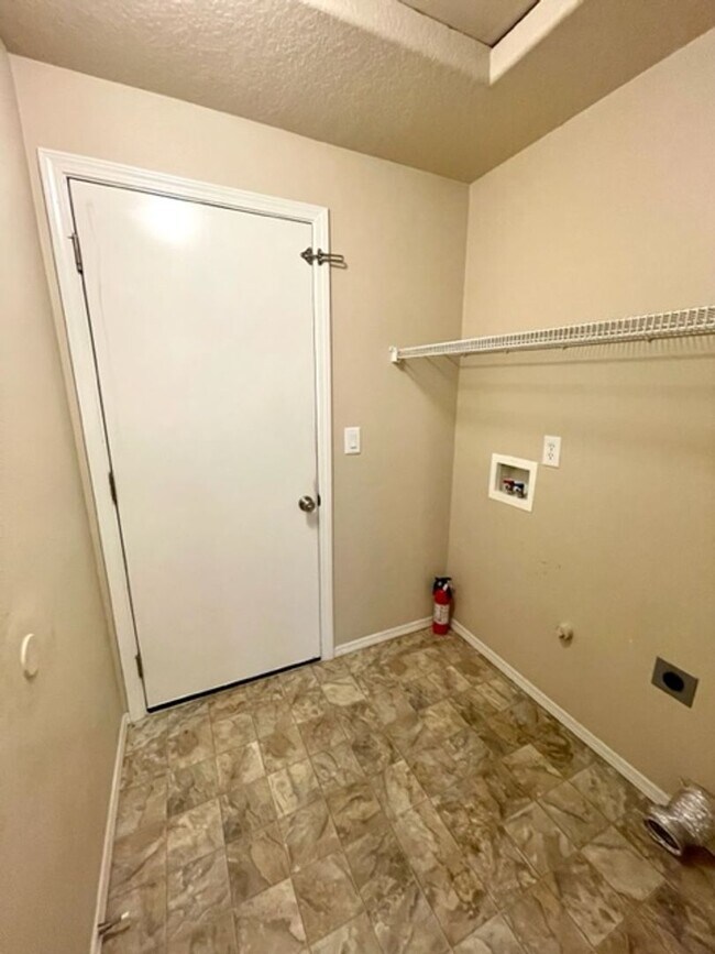 Building Photo - Single level home in Foxborough! Fenced yard!  A/C and a gas fireplace!