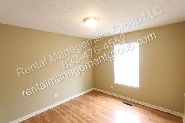 Building Photo - New On The Market! 3BR 2BA + Lower Level D...