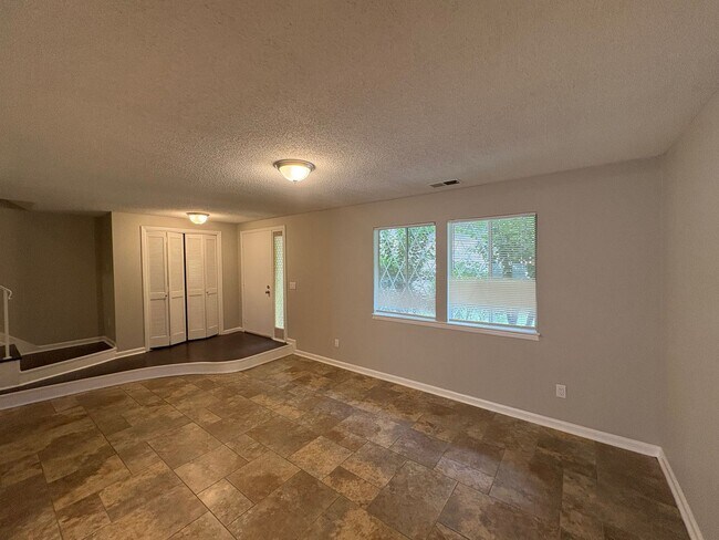 Building Photo - Four Bedroom Townhome Available Now