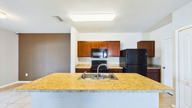 Building Photo - 4-Bedroom Home with Spacious Layout in Ayersworth Glen – Wimauma, FL