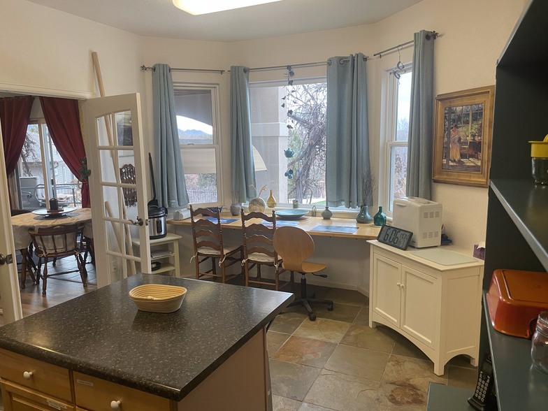 Kitchen Island & Breakfast Bar - 13385 W 67th Pl