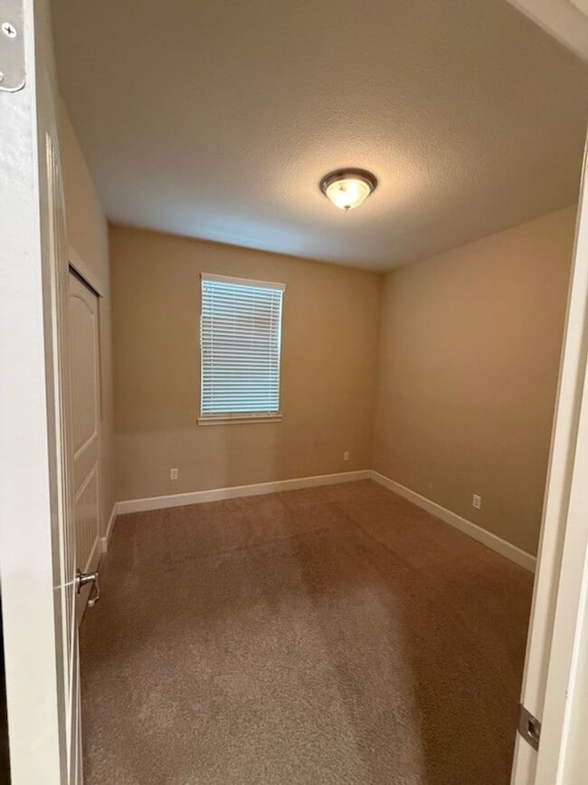 Building Photo - Solar Home with EV Garage Charging. 4 Bedroom Home with Downstairs Bedroom and Full Bathroom.