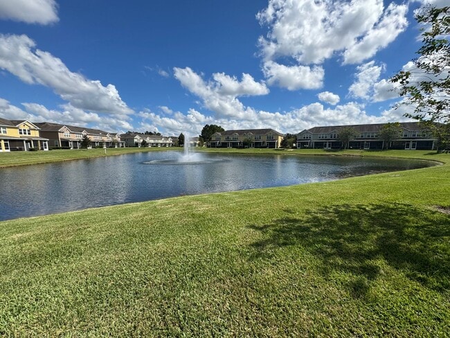Building Photo - Lake Views. Upgraded Finishes. Gated Commu...