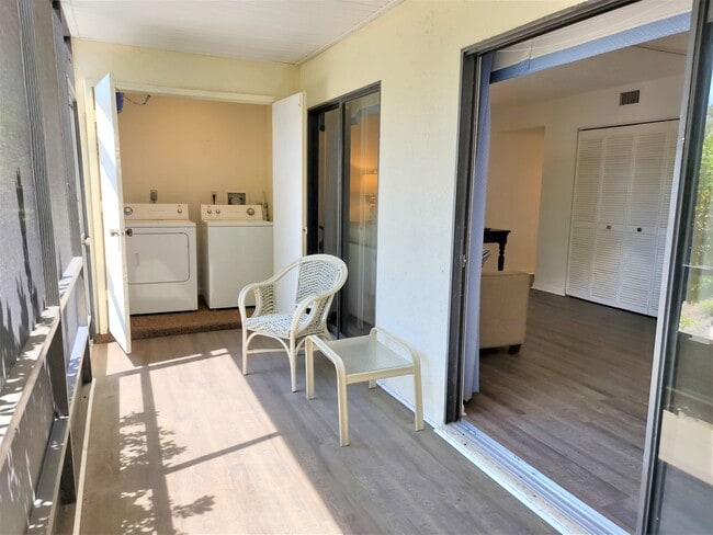 Building Photo - Bird Bay Village Annual Rental – Furnished 1st Floor Unit with Covered Parking