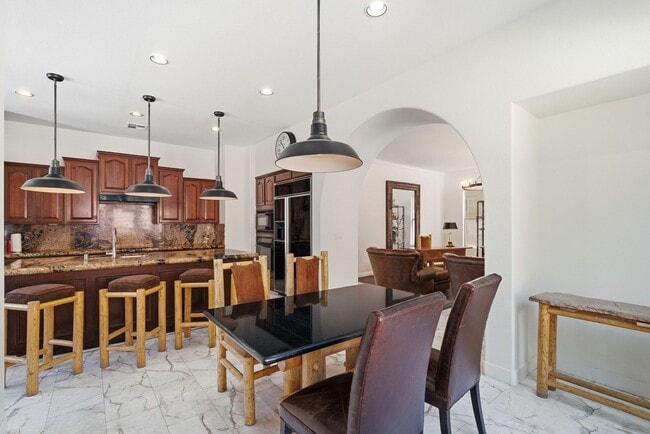 Building Photo - Private Gated Christopher Homes Estate in The Vineyards | Resort-Style Backyard & Strip Views