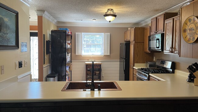 Kitchen from den - 229 Quail Run