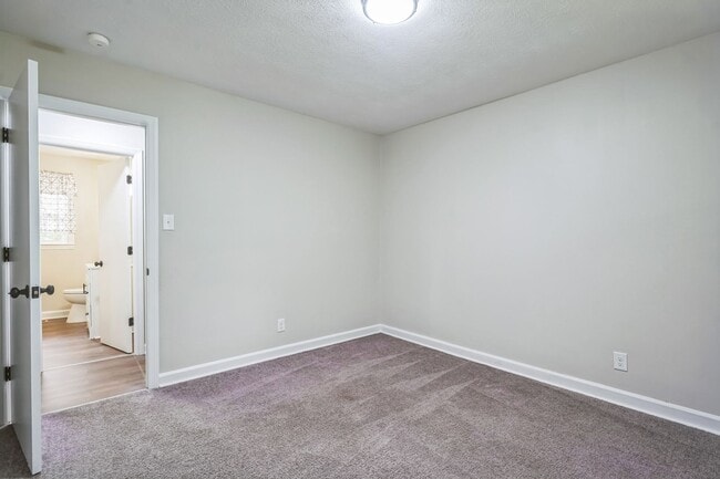 Building Photo - 4BR Brick Ranch with Upgrades & Room to Feel at Home!