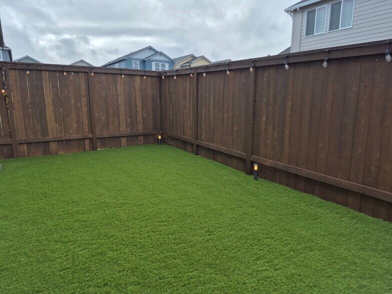 Fenced Side Yard with Turf Grass - 31741 NW Blake Terr