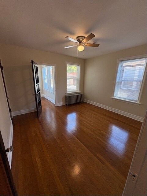 Bedroom with french door to sunroom - 7141 Tulane Ave