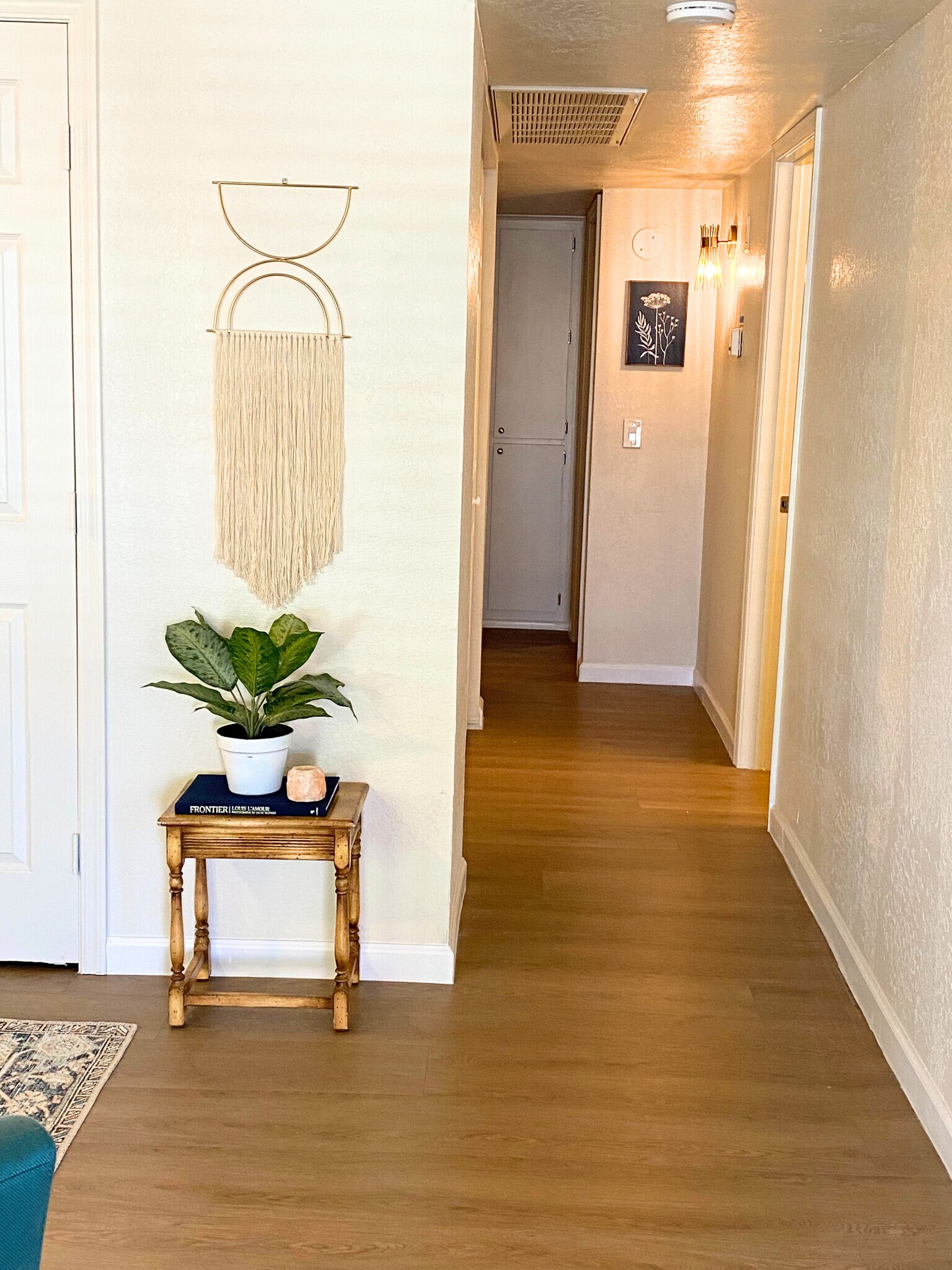 Hallway leading into bathroom and rooms. - 1795 W 28th St