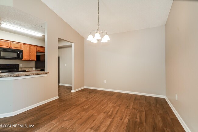 Building Photo - 9845 Paddlewheel Dr W