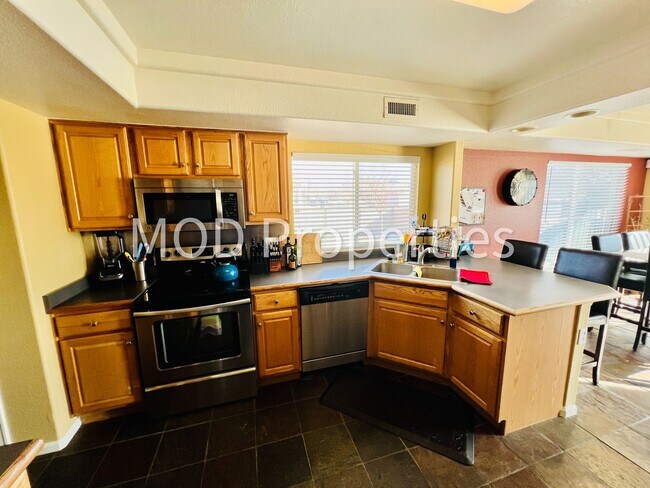 Building Photo - $0 DEPOSIT OPTION. GREEN VALLEY RANCH, CORNER LOT, BIG DECK, LOFT, STAINLESS APPLIANCES!