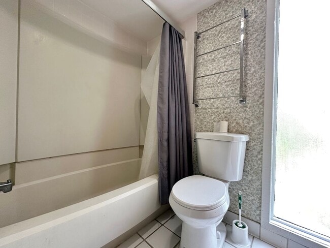 Building Photo - Lofty Vibes & Backyard Views – Your Dream ...