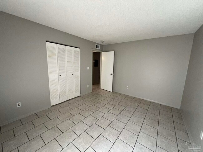 Building Photo - 6809 Tiki Ln