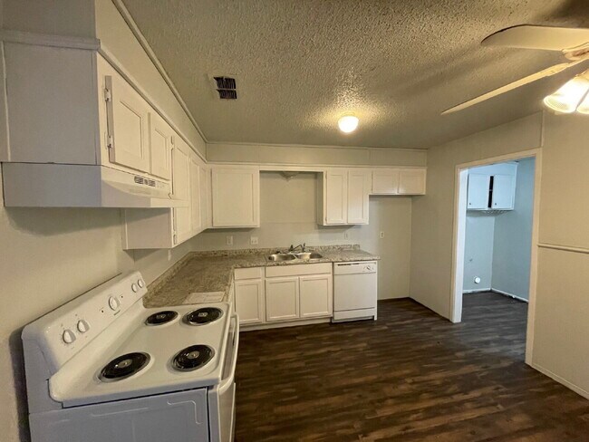 Building Photo - Updated South Lubbock Duplex — Spacious 2BD/1.5BA with Private Yard & Modern Finishes
