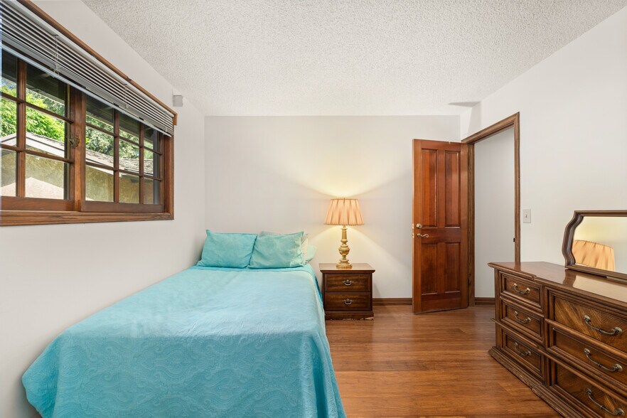 2nd large bedroom with fully cedared wood closet with hill view - 1557 E Puente St