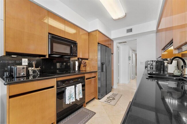 Building Photo - 18671 Collins Ave