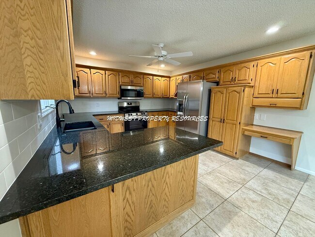 Building Photo - Spacious 3 Bedroom Home with Finished Basement, Covered Deck & Fenced Yard