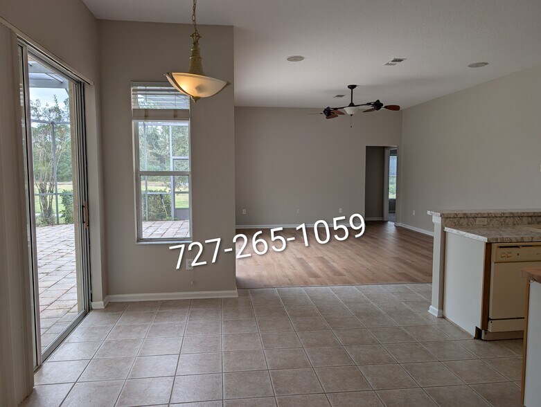 Dining Room and Open Middle Room - 26000 Risen Star Dr