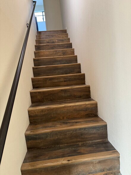 Stairs to second floor - 10824 Palms Blvd