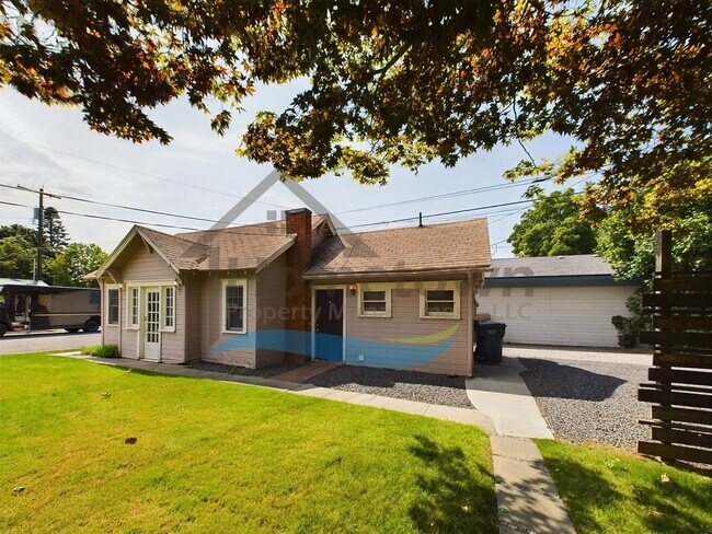 Building Photo - 1 Bedroom Cottage with Off-Street Parking Available in Midtown Coeur d'Alene!