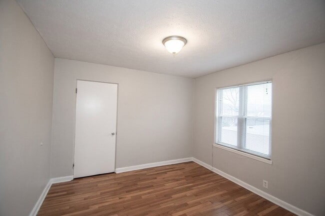 Building Photo - "Charming 2-Bedroom Retreat with Hardwood Elegance in Indianapolis"