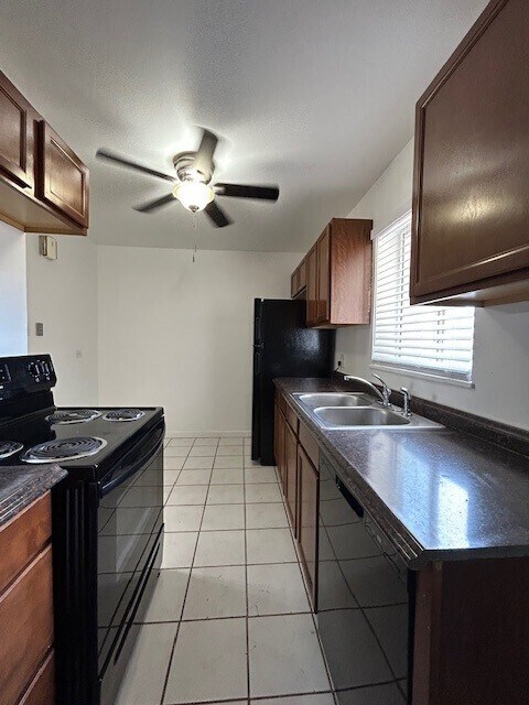 Building Photo - Available now! Spacious living room. Newly...