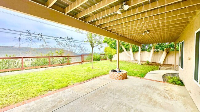 Building Photo - Spacious Two-Story Home with Three-Car Att...