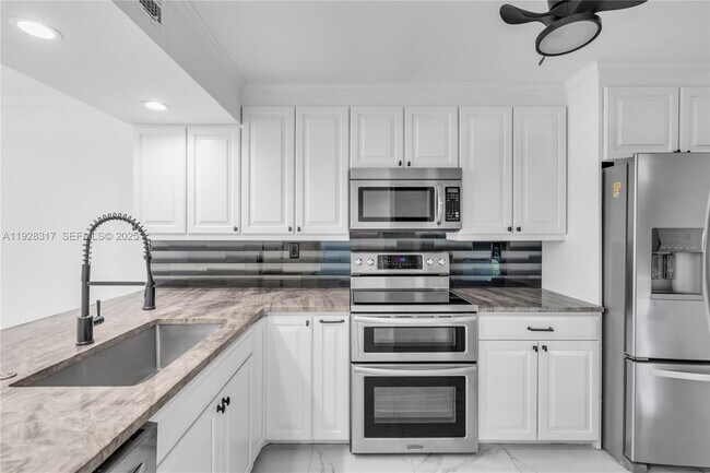 Building Photo - 12 Royal Palm Way