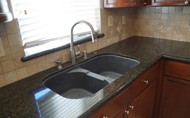 Building Photo - 8809 Las Olivas Ave