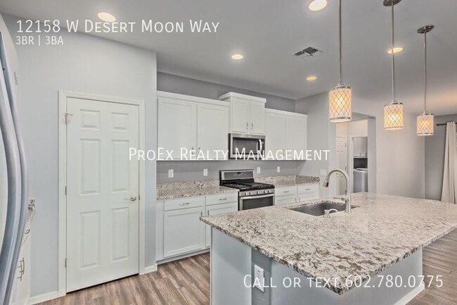 Building Photo - 12158 W Desert Moon Way