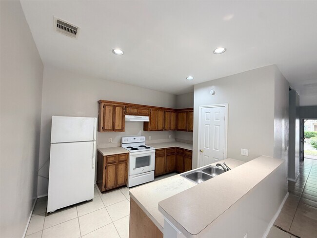 Building Photo - 12818 Magenta Oaks