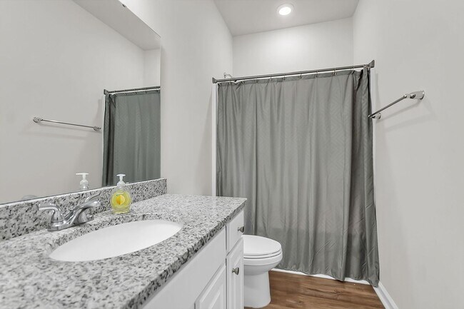 Building Photo - Spacious 4-Bedroom Home with Modern Upgrad...