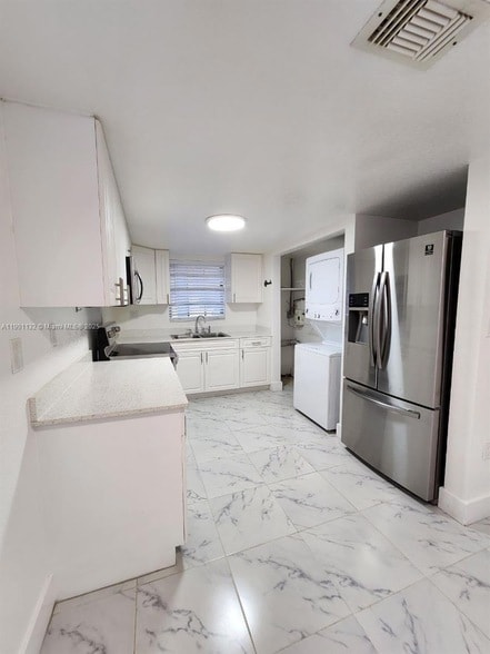 Building Photo - 5100 W 12th Ln