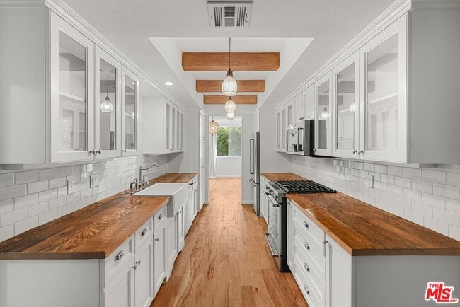 Building Photo - 10671 Holman Ave