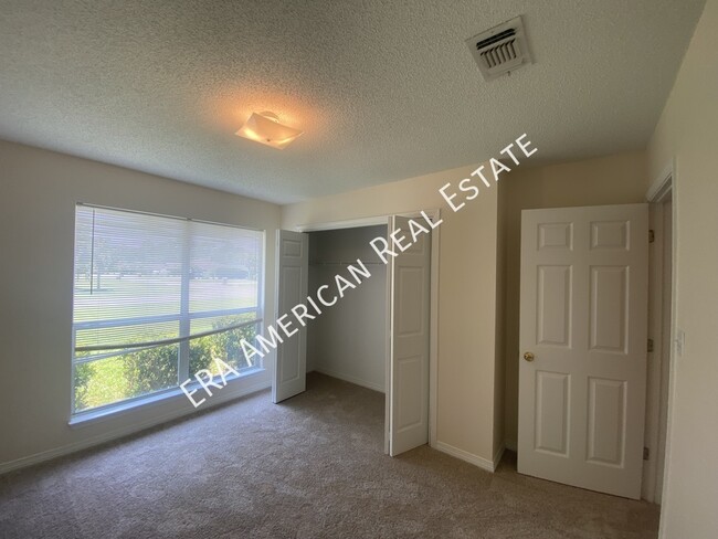 Building Photo - 7468 Woodmont Rd