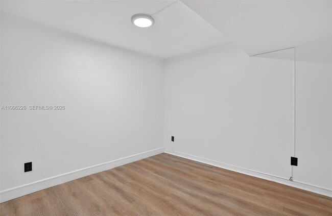 Building Photo - 10240 Collins Ave