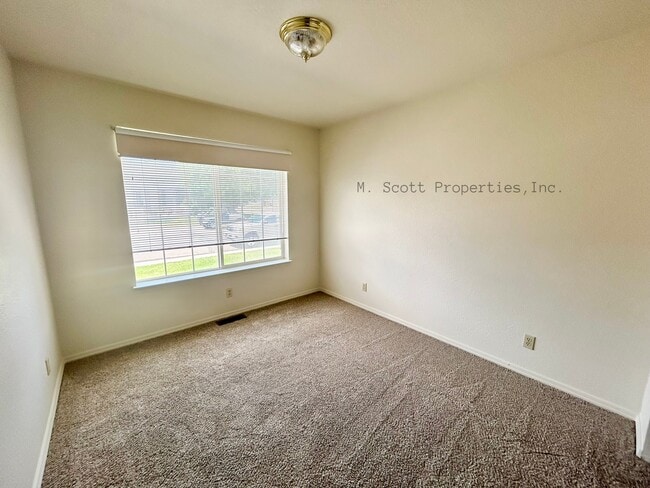 Building Photo - 1449 N Marion Russell Dr