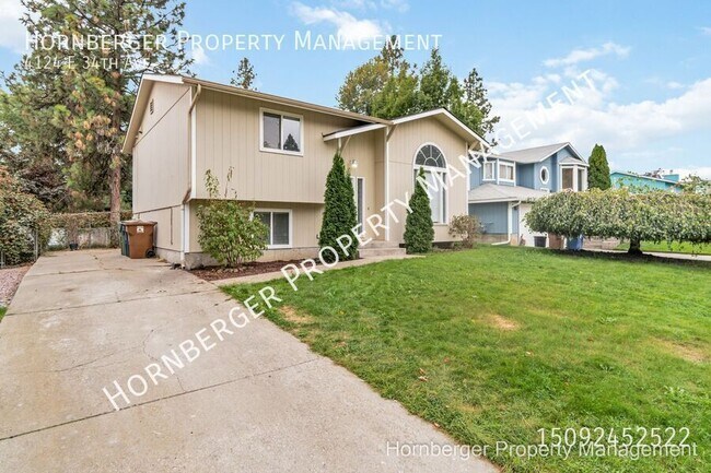 Building Photo - 4124 E 34th Ave